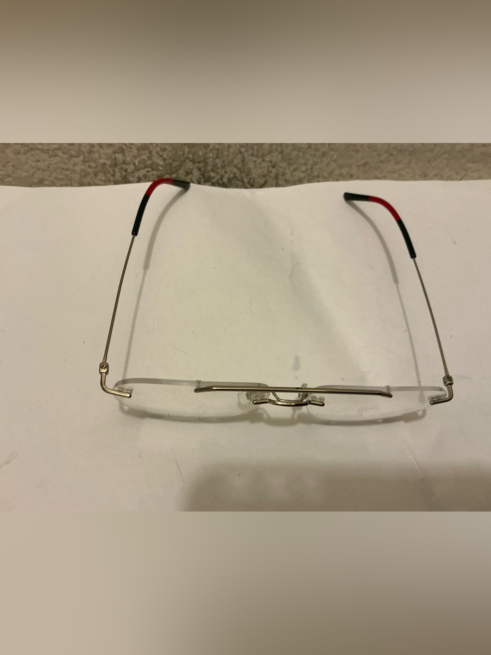 Gucci Rimless Glasses with Gold Frame and Red/green Temple Tips